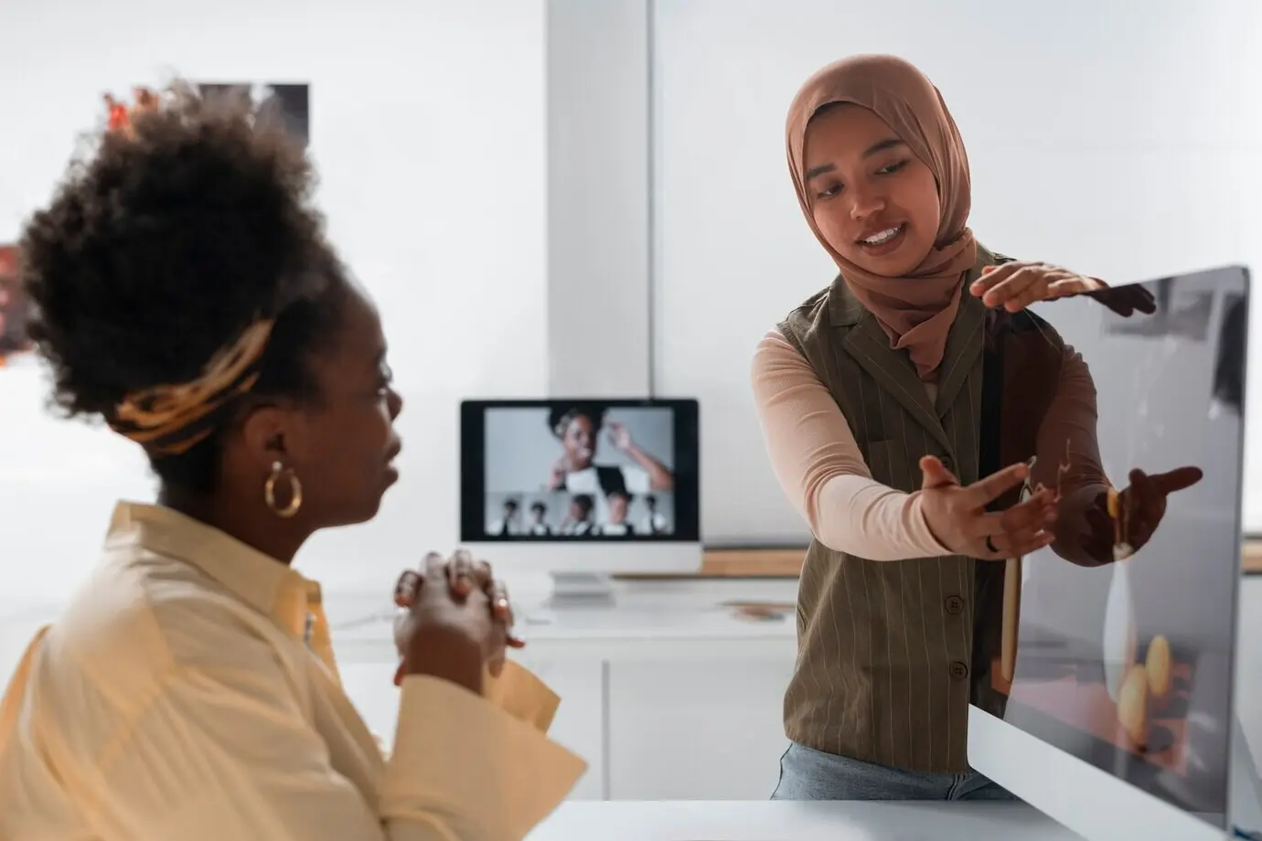 A medium shot of women in a studio.